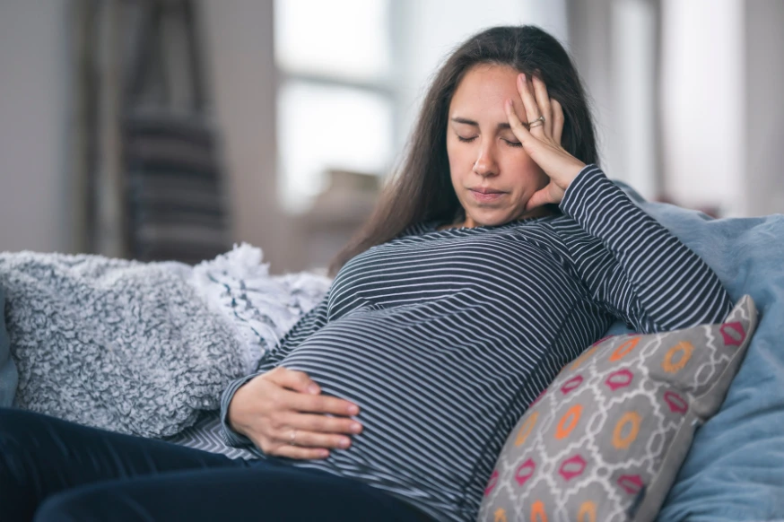 pregnant woman feeling tired due to poor diet