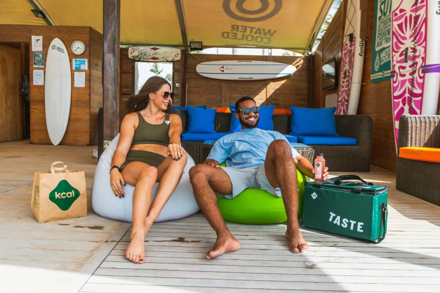 Couple relaxing by the beach