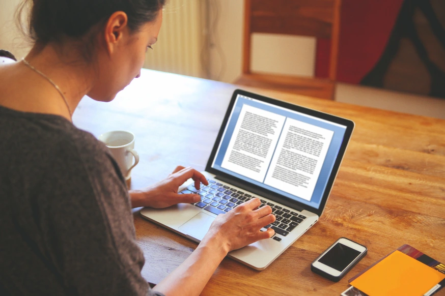 Woman practicing creative writing in her leisure time